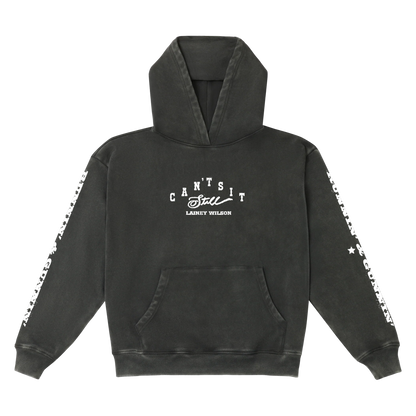 Black hoodie with white ‚Äôcan‚Äôt sit still‚Äô graphic and star-patterned sleeve trim.