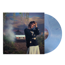 Load image into Gallery viewer, Ruel 4th wall vinyl with blue and white marbled record coming out of sleeve