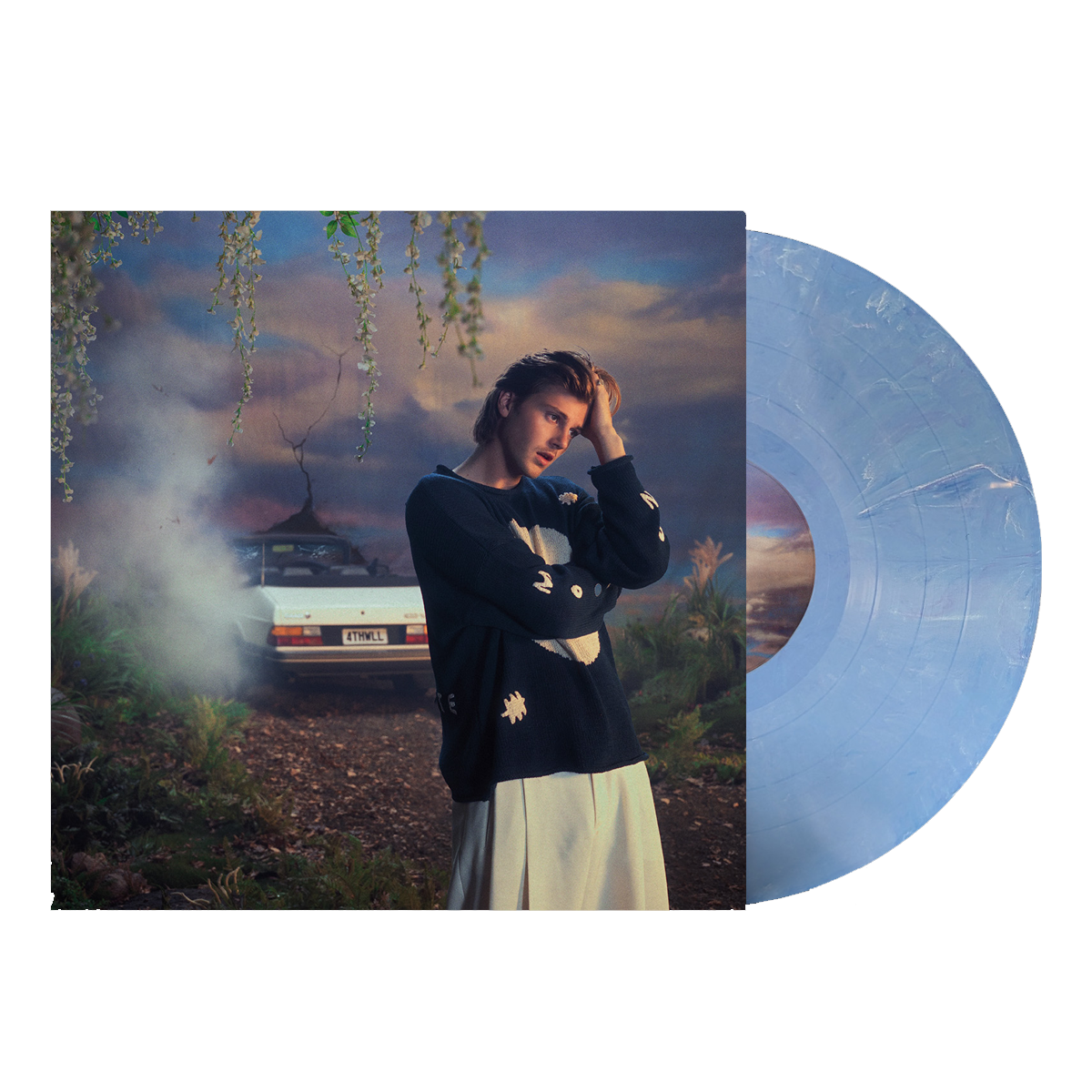 Ruel 4th wall vinyl with blue and white marbled record coming out of sleeve