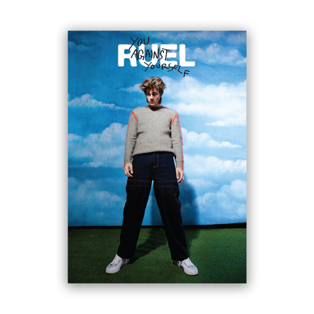 Poster of Ruel in jeans and grey sweater, against cloud background. With RUEL Logo and 'you against yourself' written in marker on top