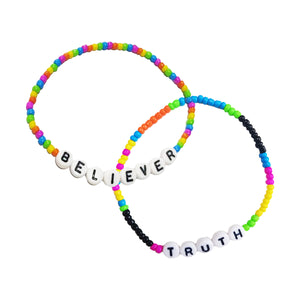 Two Rainbow beaded bracelets with letter beads saying 'Believer' and 'Truth'