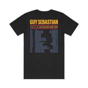 Black t-shirt back with GUY SEBASTIAN logo in yellow, and tour dates and cities in blue underneath