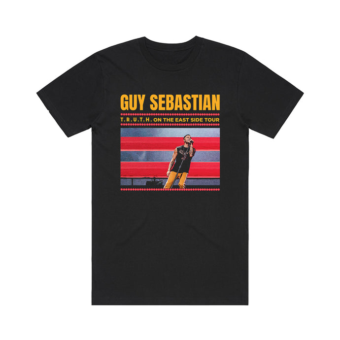 Black t-shirt front with image of Guy singing, with yellow Logo and tour text